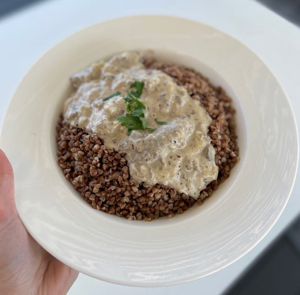 Plate of beef stroganoff over buckwheat in Boise