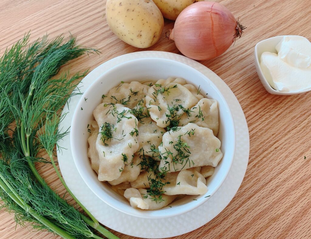 plated vareniki dumplings with vegetables